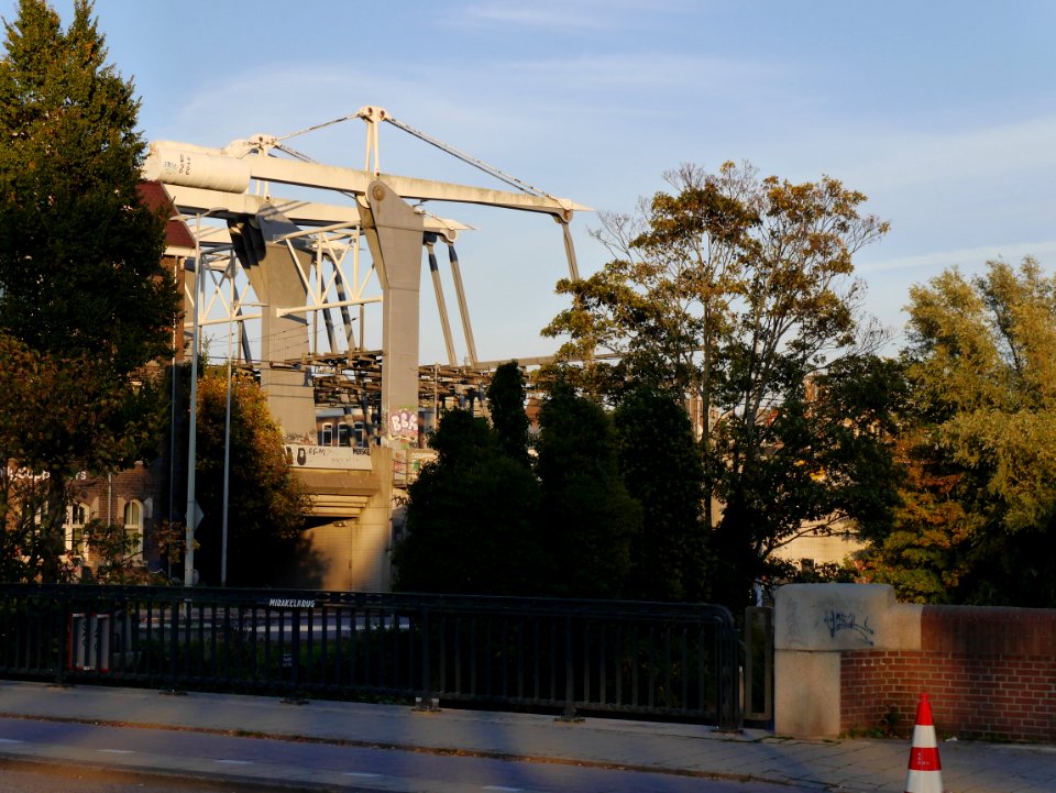 Free photo Amsterdam: picture of train bridge in city Amsterdam, Houtmankade with light and shadows; october 2018