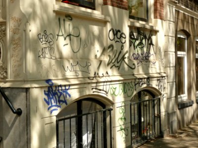 2015.05 - Amsterdam, photo of street-art & shadows, sun-light & wall-tags on 19th century house-fronts in Sarphatistraat, Amsterdam city - geotagged free urban picture, in public domain / Commons; Dutch city photography, Fons Heijnsbroek, The Netherlands photo