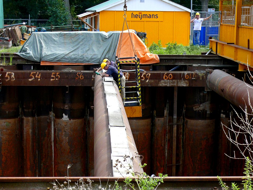 2007.08 - 'A look into the construction pit' of the metro building site underground, with the characteristic iron sheet pilings; location on the North side of the city, near the water IJ; Dutch city photo + geotag, Fons Heijnsbroek, The Netherlands photo