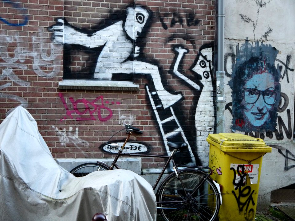 Urban street-art and wall-painting art on the corner Anjelierstraat and the canal Prinsengracht on the border of Jordaan district Amsterdam, November 2013; photo Amsterdam city; urban photographer Fons Heijnsbroek, 2013