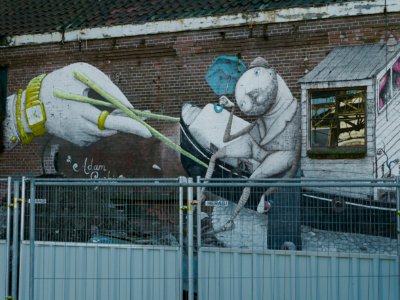Graffiti street art on a brick old wall - free photos Amsterdam, Fons Heijnsbroek photo