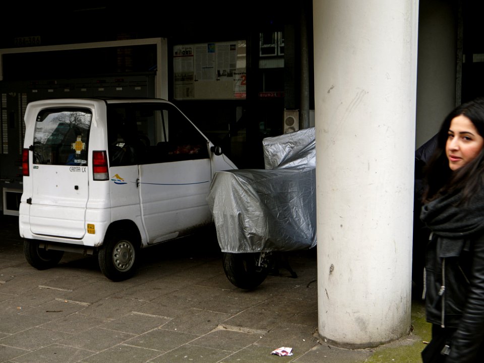 2016.04 - Amsterdam photoof people and daily street-life - parked vehicles at the street Weesperstraat in Amsterdam city; urban still-life - geotagged free urban picture, in public domain / Commons; Dutch photography, Fons Heijnsbroek, The Netherlands