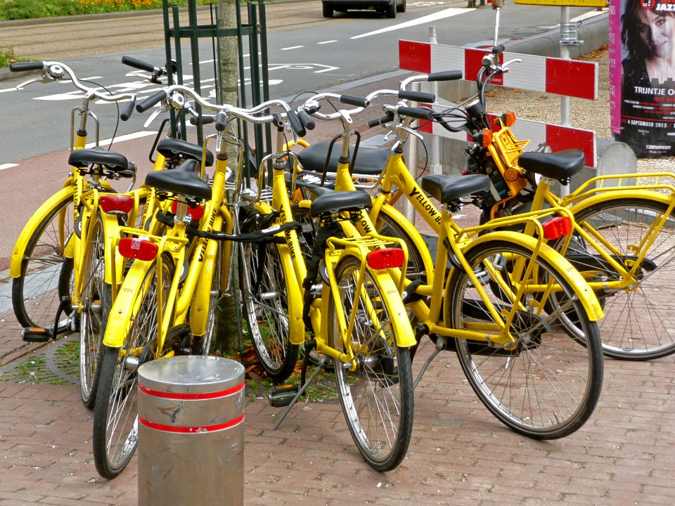 2015.08 - Amsterdam, photo of yellow-bikes - A group of parked bikes on the square Museumplein - geotagged free urban picture, in public domain / Commons; Dutch photography, Fons Heijnsbroek, The Netherlands photo