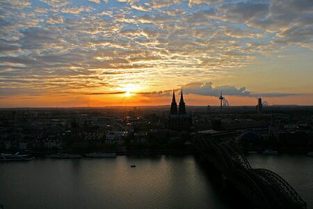 Cologne cathedral sunset rhine ship photo