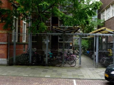 University-buildings and gate on the Plantage Muidergracht; photo Amsterdam city; urban photographer Fons Heijnsbroek