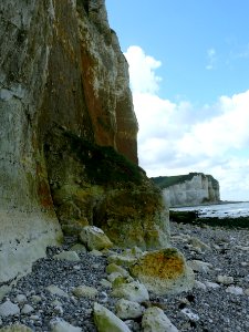 2007.09 -  'Low view in southern direction on the cliff walls', and the rocky beach near Petit-Dalle in Normandy France with a quiet sea; French landscape photography, Fons Heijnsbroek