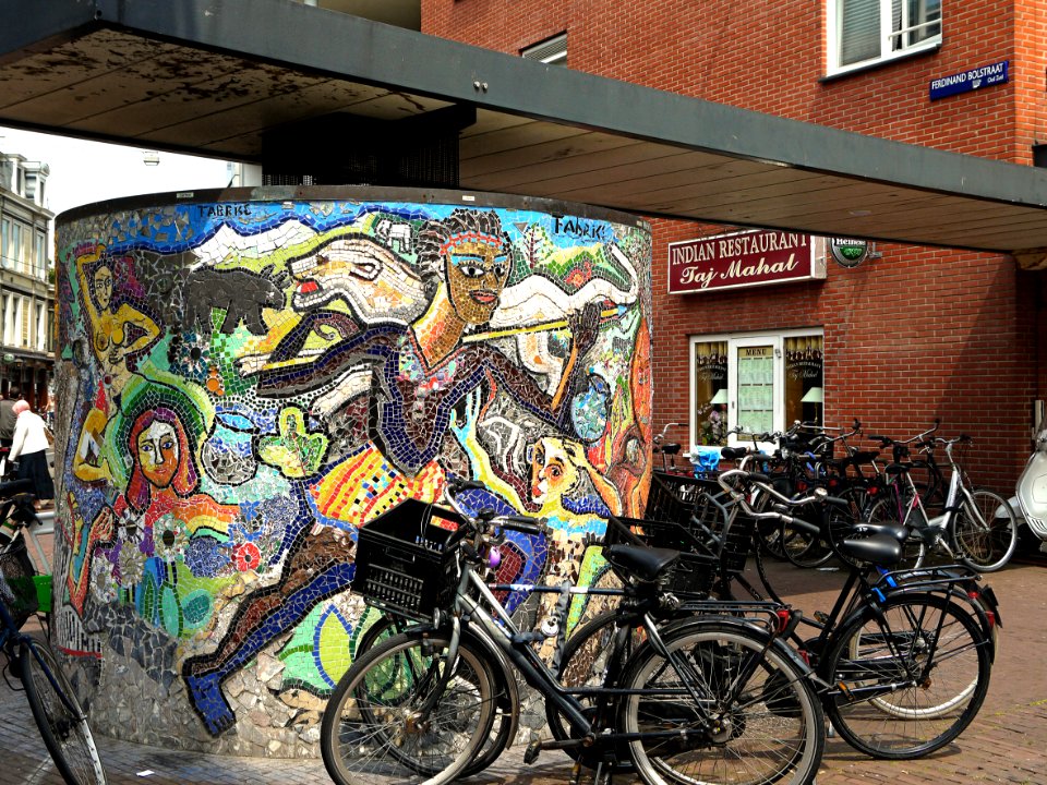 Close-up photo of a piece of wall art mosaic by the Amsterdam artist Fabrice, close to the begin of Ferdinand Bolstraat and on the corner of Heineken-plein (square); city center of Amsterdam; - urban photography by Fons Heijnsbroek, the Netherlands, 2013