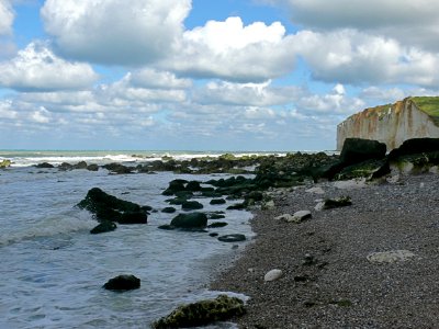 2007.09 - 'Wide view with sun and white clouds', over the shore and quite surf near Petit-Dalle in Normandy France with a quiet sea; French landscape photography, Fons Heijnsbroek photo