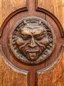 Wood carving devil photo