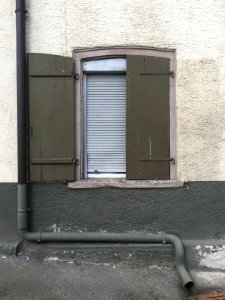 Window, wall and downpipe photo