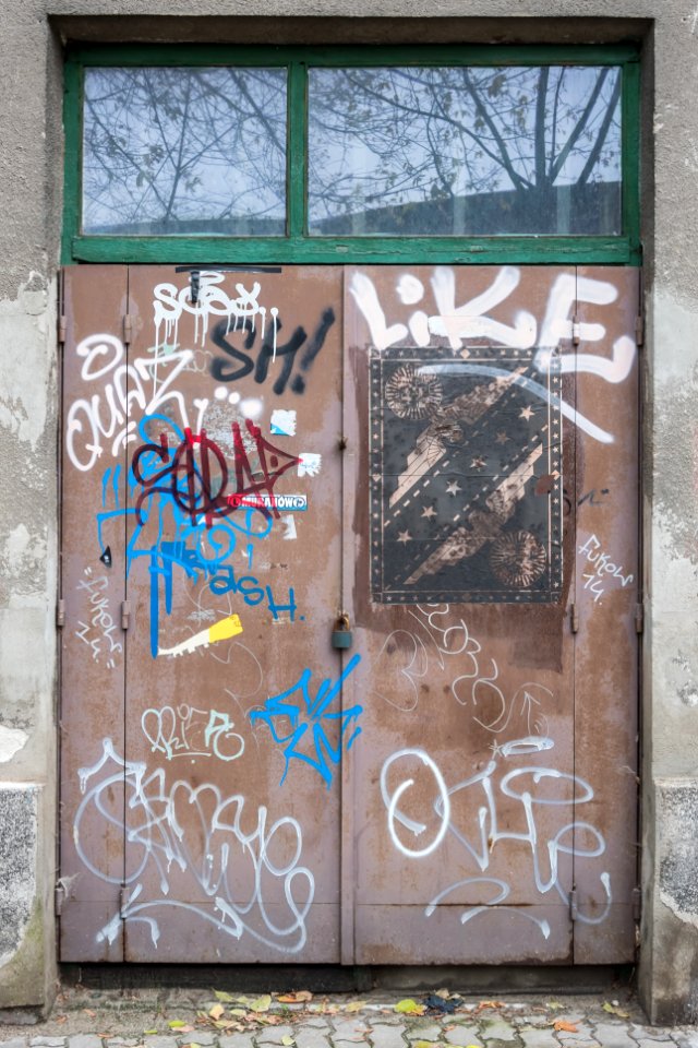 Locked door with graffiti
