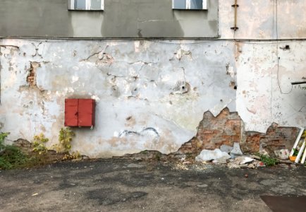 Damaged plastered wall photo