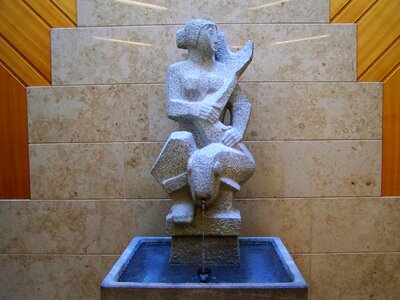 Stone sculpture fountain female figure