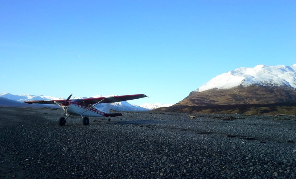 Katmai's Cessna 185 on the beach at Swikshak