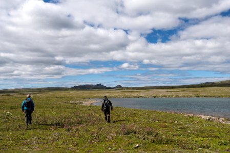 Two people walking in the Katmai Preserve NPS Photo/Russ Taylor