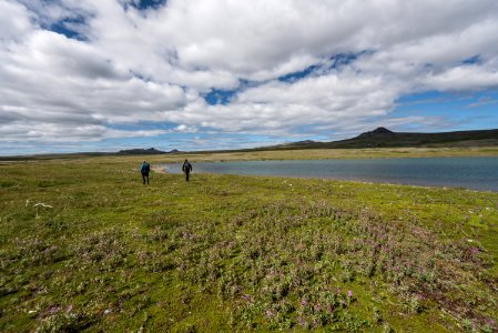 Two people walking in the Katmai backcountry NPS Photo/Russ Taylor