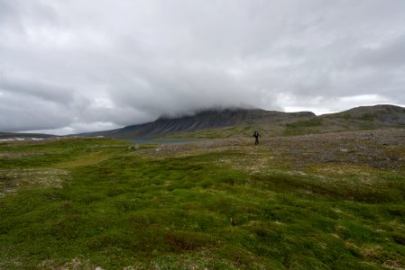 Walking across tundra in the Katmai Preserve NPS Photo/Russ Taylor