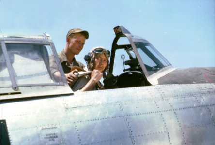 Lt. Hiawatha Mohawk straps into his Republic P-47 for a mission in Italy