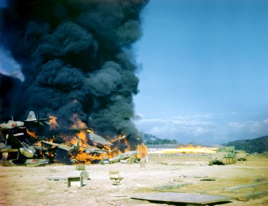 Sherman tanks set fire to Japanese aircraft