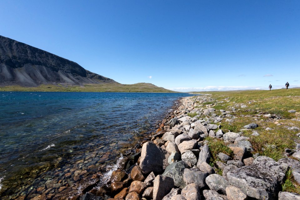 Hikers walking near Mirror Lake, Katmai Preserve NPS Photo/Russ Taylor