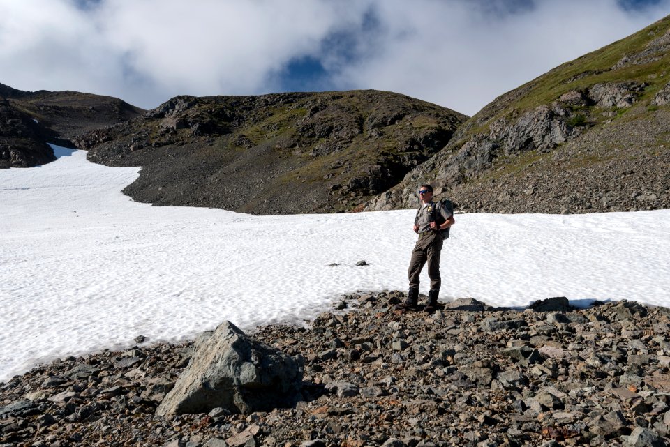 A park ranger looks over the backcountry in the Katmai Preserve NPS Photo/Russ Taylor