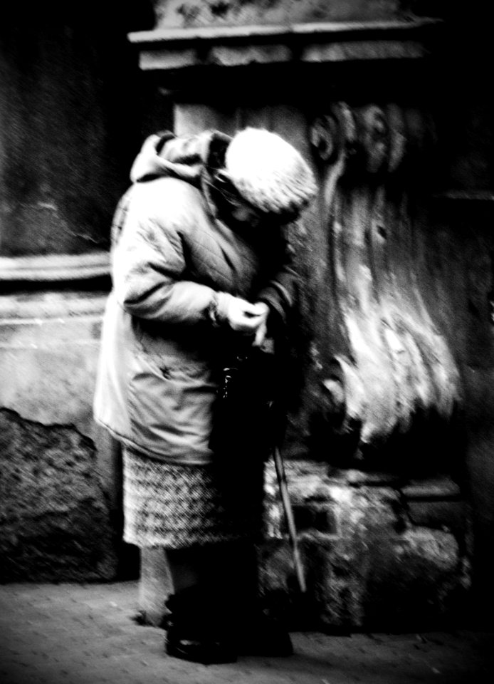 Old Lady Leaving a Church