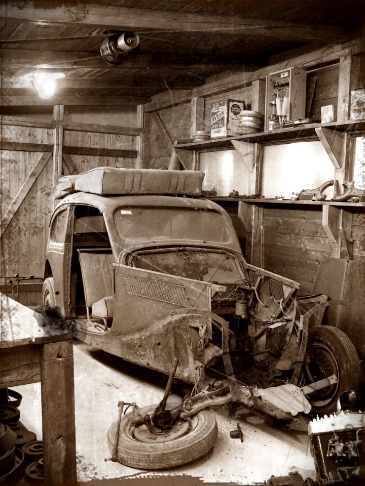 Car Wreckage in Vintage Workroom