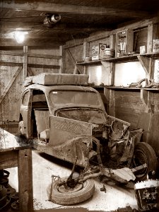 Car Wreckage in Vintage Workroom