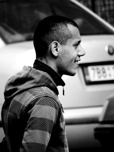 Smiling Man at Crosswalk