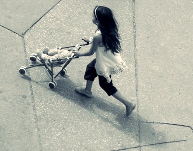 Little Romany Girl with Toy Baby Carriage