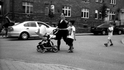 Vilia - Family Crossing a Street photo