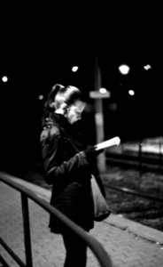 Praktica BC1 - Young Woman Reading at Tram Stop