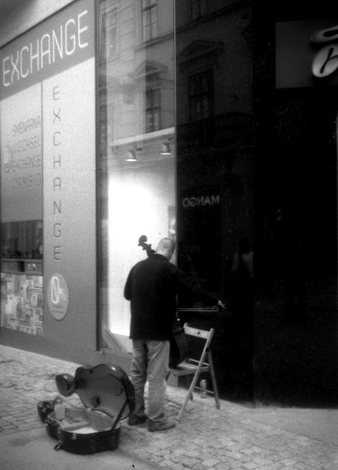 Penti - Street Musician Tuning His Instrument