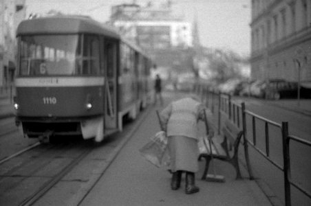 Praktica BC1 - Old Lady Cleaning the Tram Stop photo
