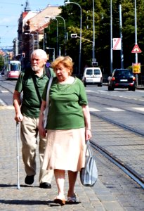 Elderly Couple at Tram Stop photo