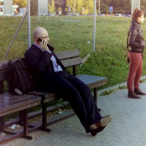 Kiev 4 - Man Making a Phone Call and Looking at a Girl