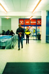 Praktica MTL 5 + Helios 44-2 2/58 - People Leaving a Supermarket at Night photo