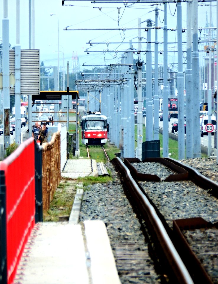 Tram Arriving between the Poles