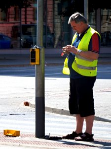 Man Repairing Traffic Lights photo