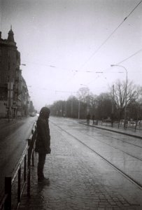 Agfa Billy Record 7.7 - Woman at Tram Stop in Rainy Day photo