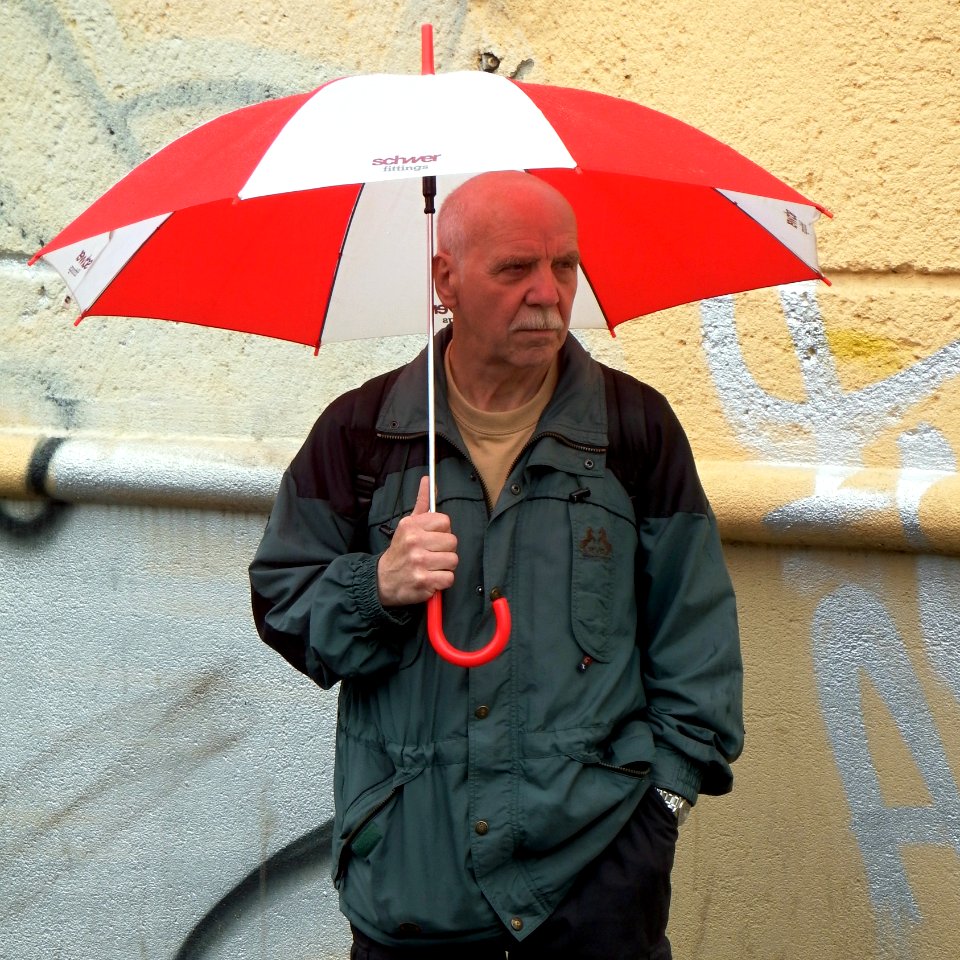 Man with Red&White Umbrella