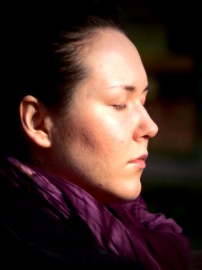 Sunbathing Woman in the Park - Portrait