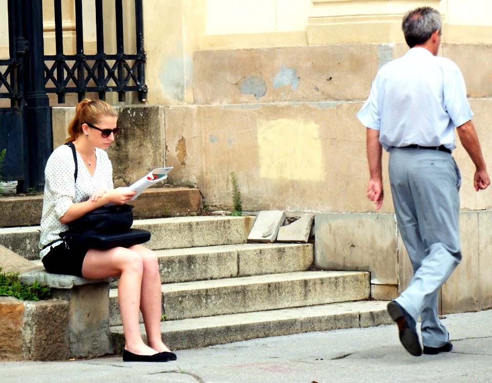 Girl Reading in front of Central Cemetery