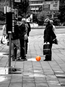 People and Balloon at Bus Stop photo