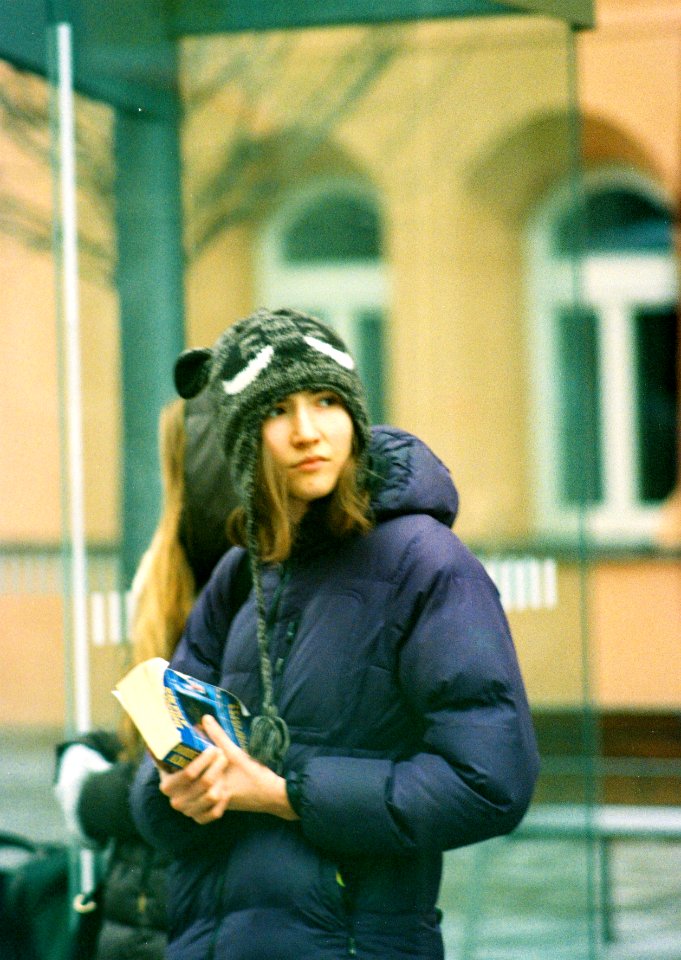 Ricoh TLS 401 + Pentacon Electric 4/200 MC - Girl at Tram Stop (taken from tram window)