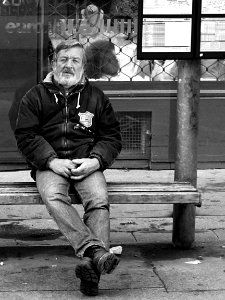 Man on the Tram Stop B&W photo