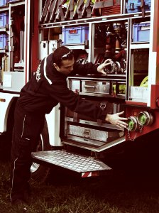 Fireman Explaining How His Car Works 1