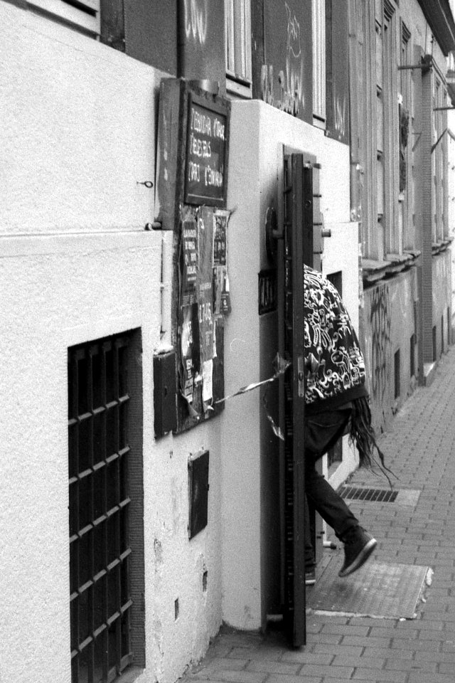 Olympus Mju II - Young Man Entering a Pub