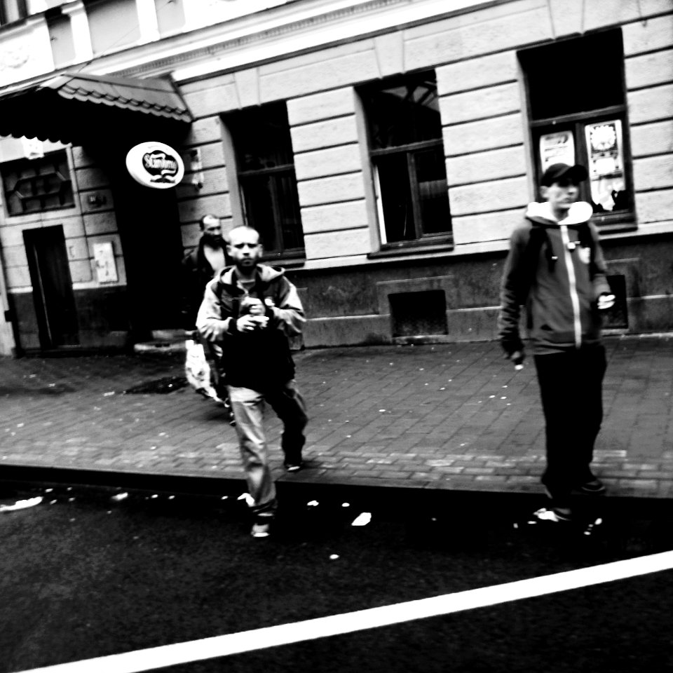 Men in front of a Pub