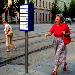 Woman Running to the Tram photo